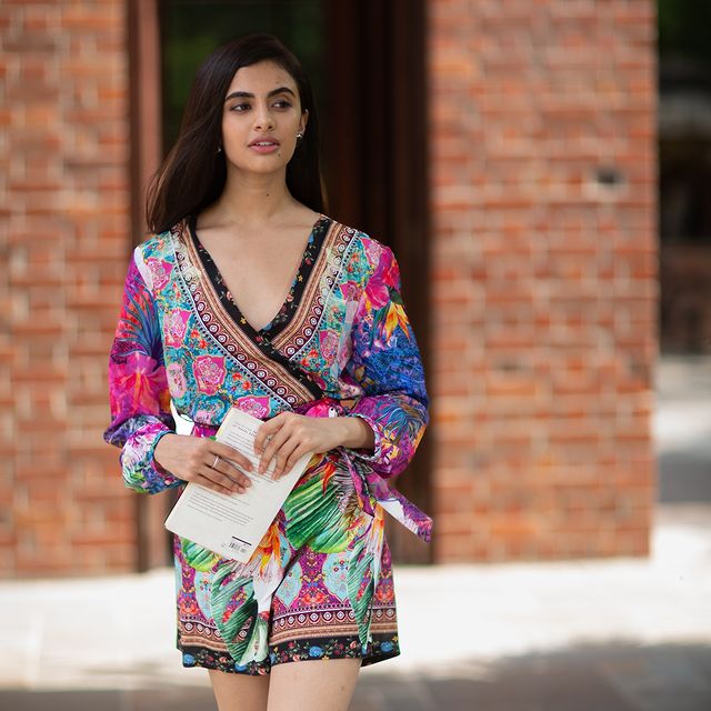 Presenting our printed one-piece with a loose silhouette, a chic belt for that perfect cinch, and a trendy V-cut neck. Elevate your look effortlessly